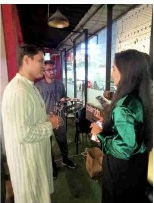 Brand promoter engaging consumers at a HORECA venue