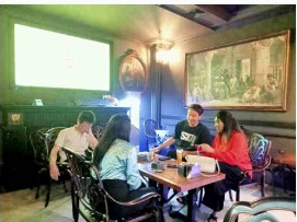 Brand promoter engaging consumers at a HORECA venue