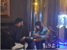 Brand promoter engaging consumers at a HORECA venue