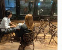 Brand promoter engaging consumers at a HORECA venue